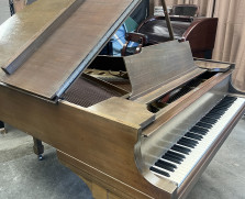 Mahogany Steinway model M baby grand piano